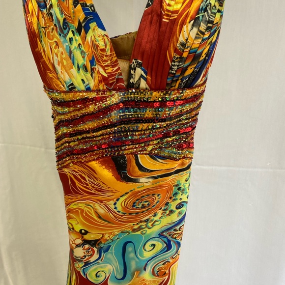 Jovani Milti Colored Long Cocktail Dresses
Excellent condition.
Sizes- 4/6 - Picture 5 of 5